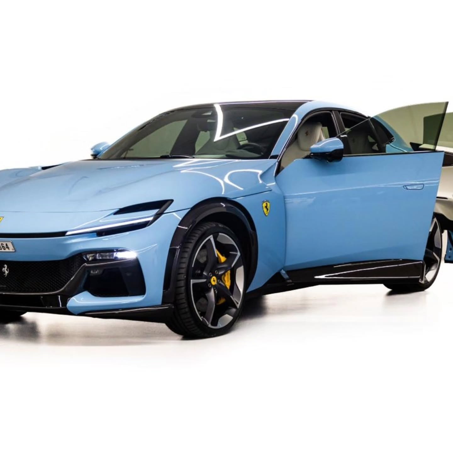 Blue luxury sports car prepared for a private Dubai arrival